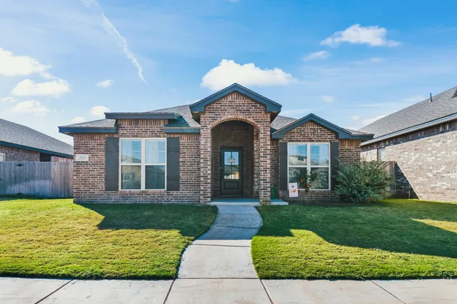 a view of a house with garden