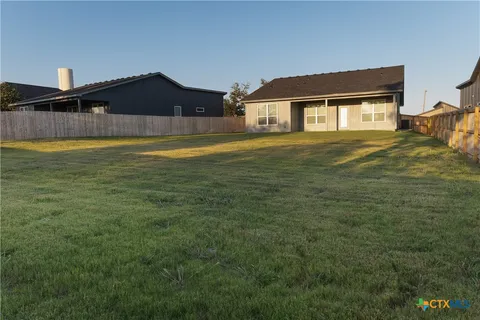 a front view of a house with swimming pool