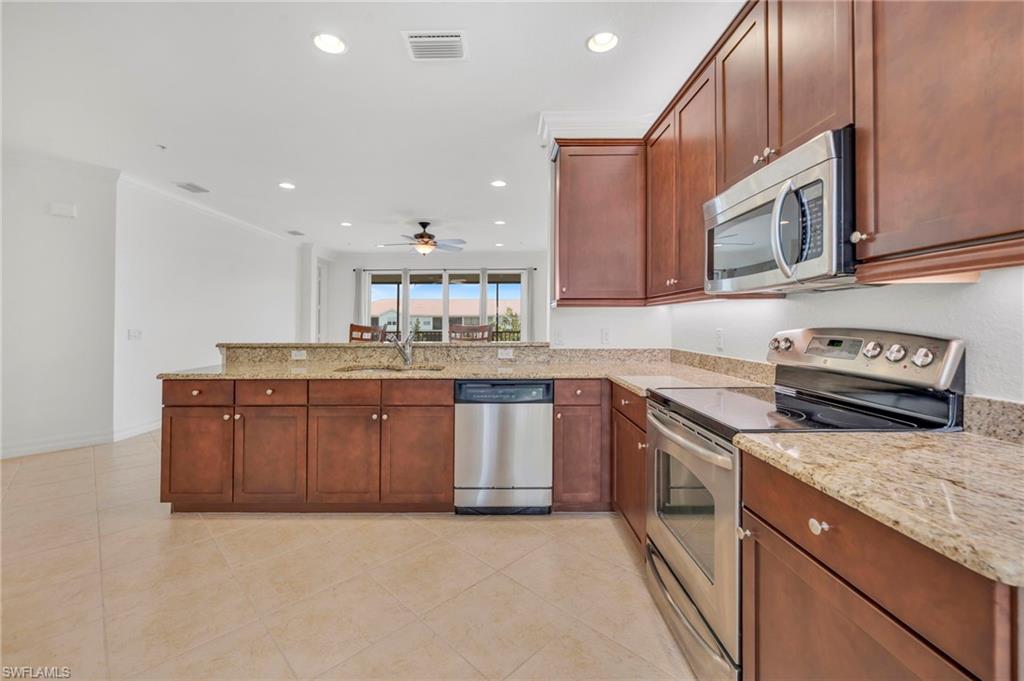 6505 Monterey Point, Unit 202 Naples, FL 34105 - Photo 6 of 30 This gives you a great view of the kitchen