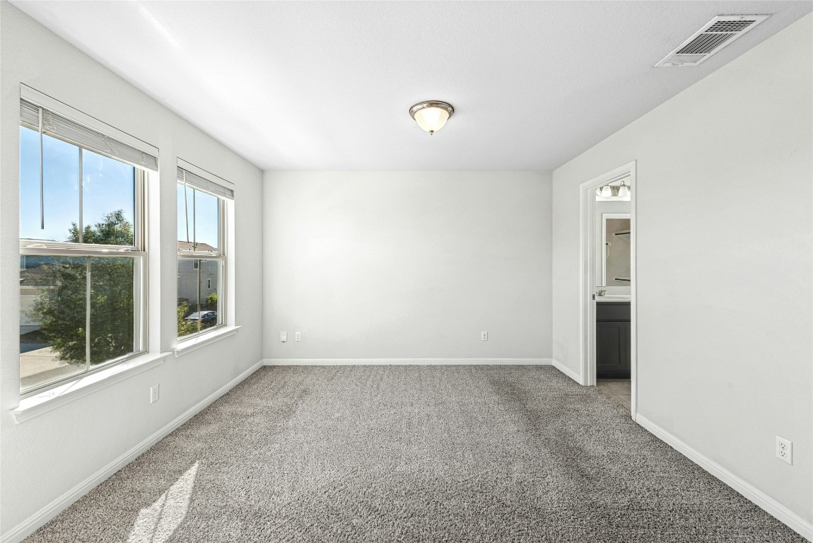 1709 Arendale Drive Leander, TX 78641 - Photo 16 of 36 a view of an empty room with a window