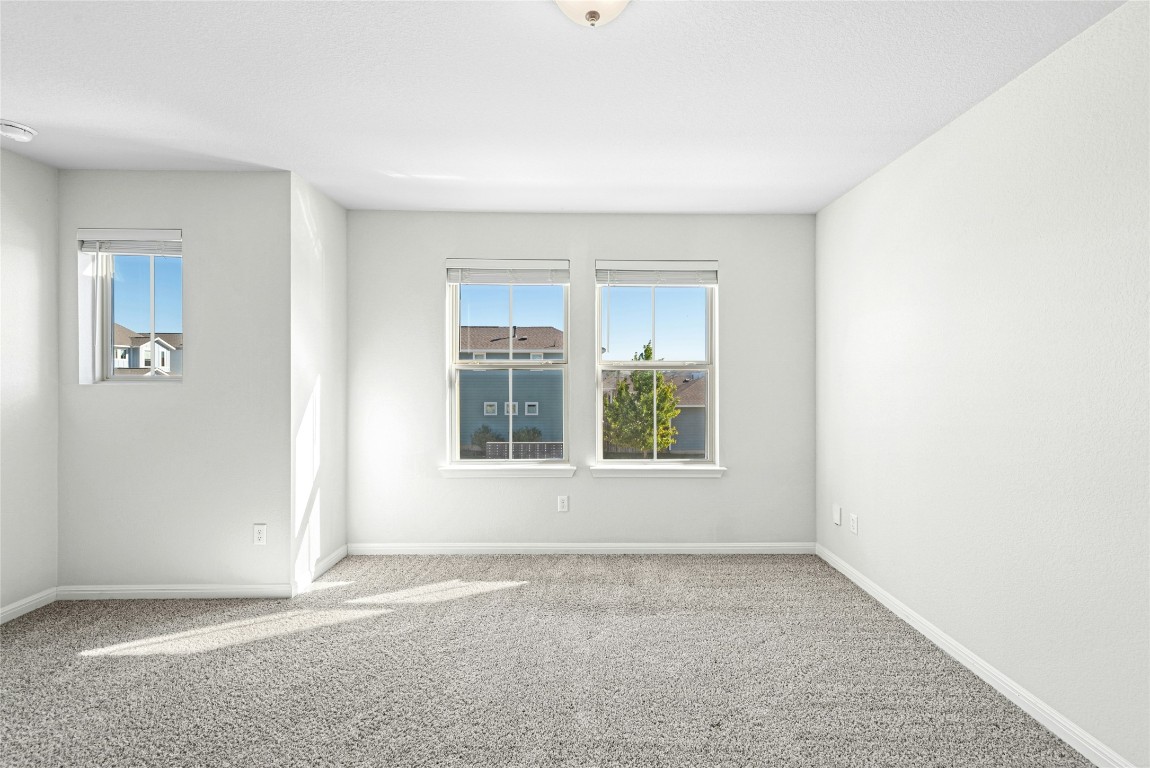 1709 Arendale Drive Leander, TX 78641 - Photo 19 of 36 an empty room with windows