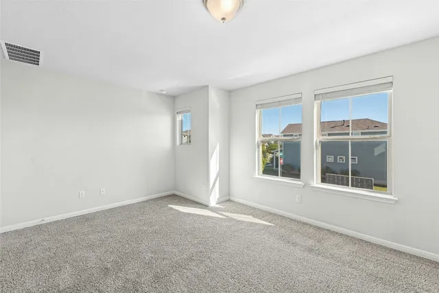 a bathroom with a sink double vanity and a mirror