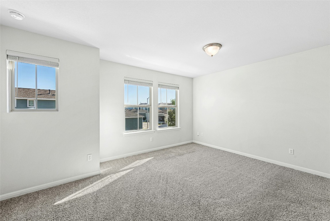 1709 Arendale Drive Leander, TX 78641 - Photo 21 of 36 a view of an empty room with a window