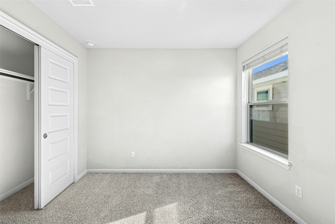 1709 Arendale Drive Leander, TX 78641 - Photo 23 of 36 an empty room with windows