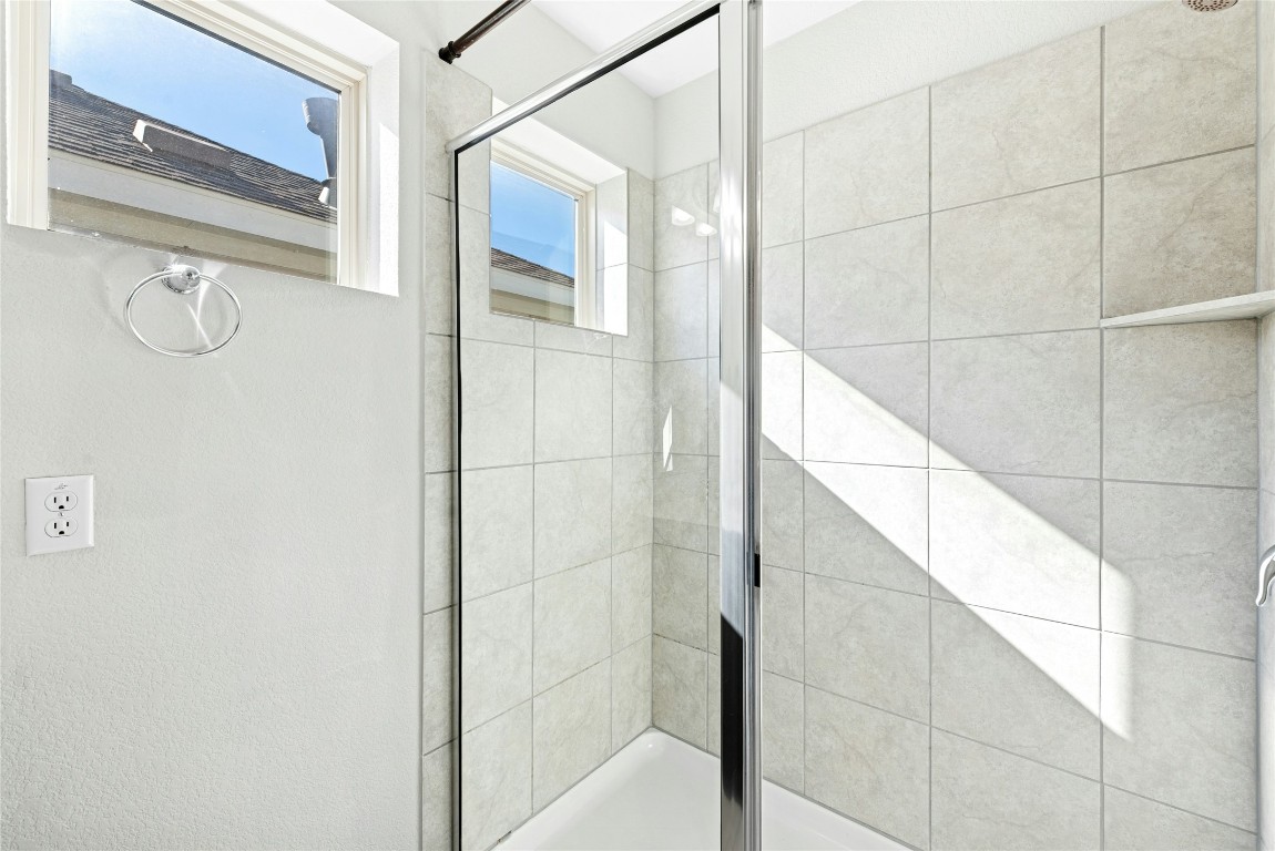 1709 Arendale Drive Leander, TX 78641 - Photo 26 of 36 a bathroom with a shower