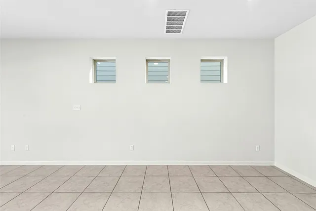 a view of small space with racks on the wall