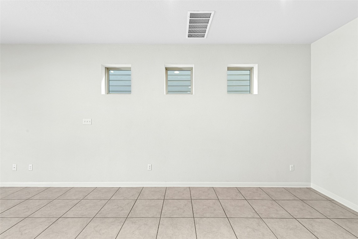 1709 Arendale Drive Leander, TX 78641 - Photo 29 of 36 an empty room with windows