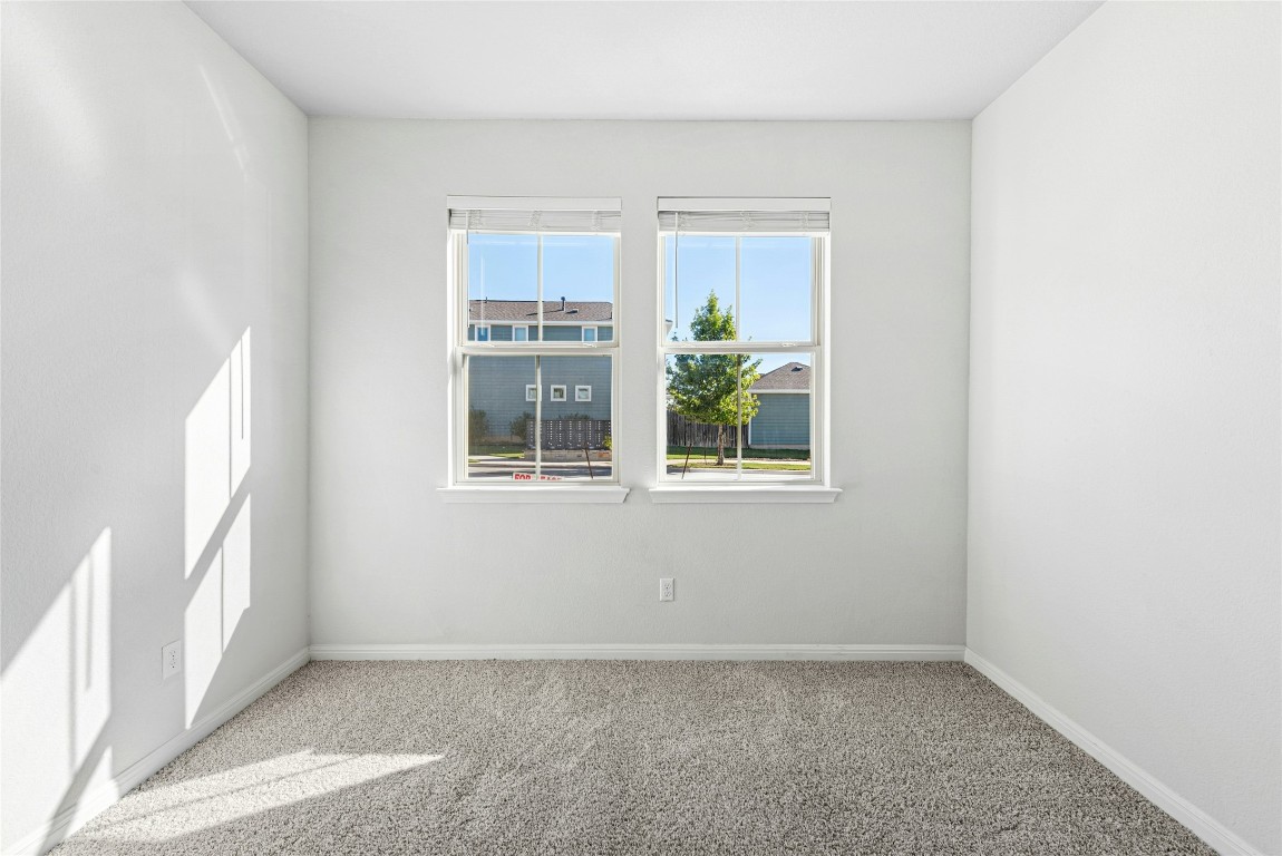 1709 Arendale Drive Leander, TX 78641 - Photo 30 of 36 an empty room with windows