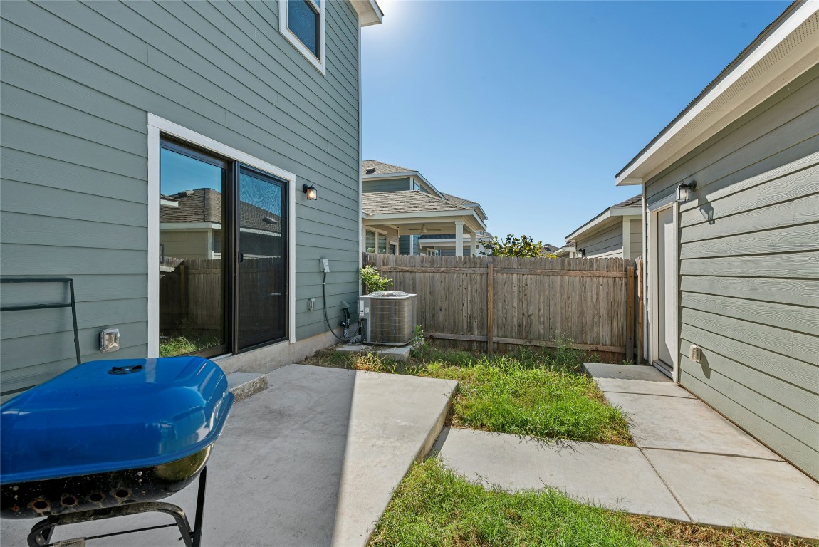 1709 Arendale Drive Leander, TX 78641 - Photo 33 of 36 a backyard of a house with seating space