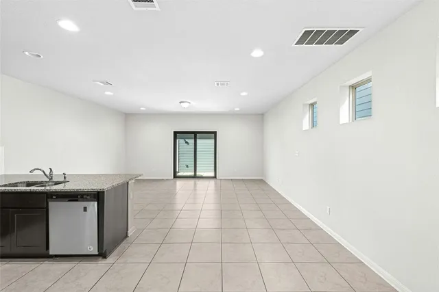 a backyard of a house with seating space