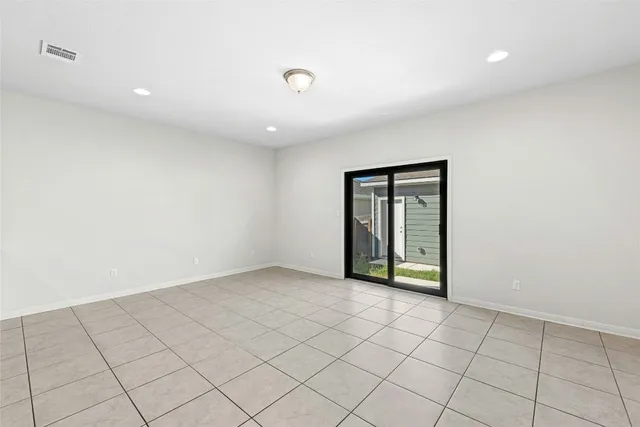 wooden floor & window in a room