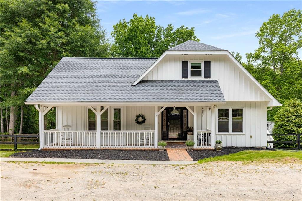 999 Bailey Road Woodstock, GA 30188 - Photo 1 of 1 a front view of a house with a yard