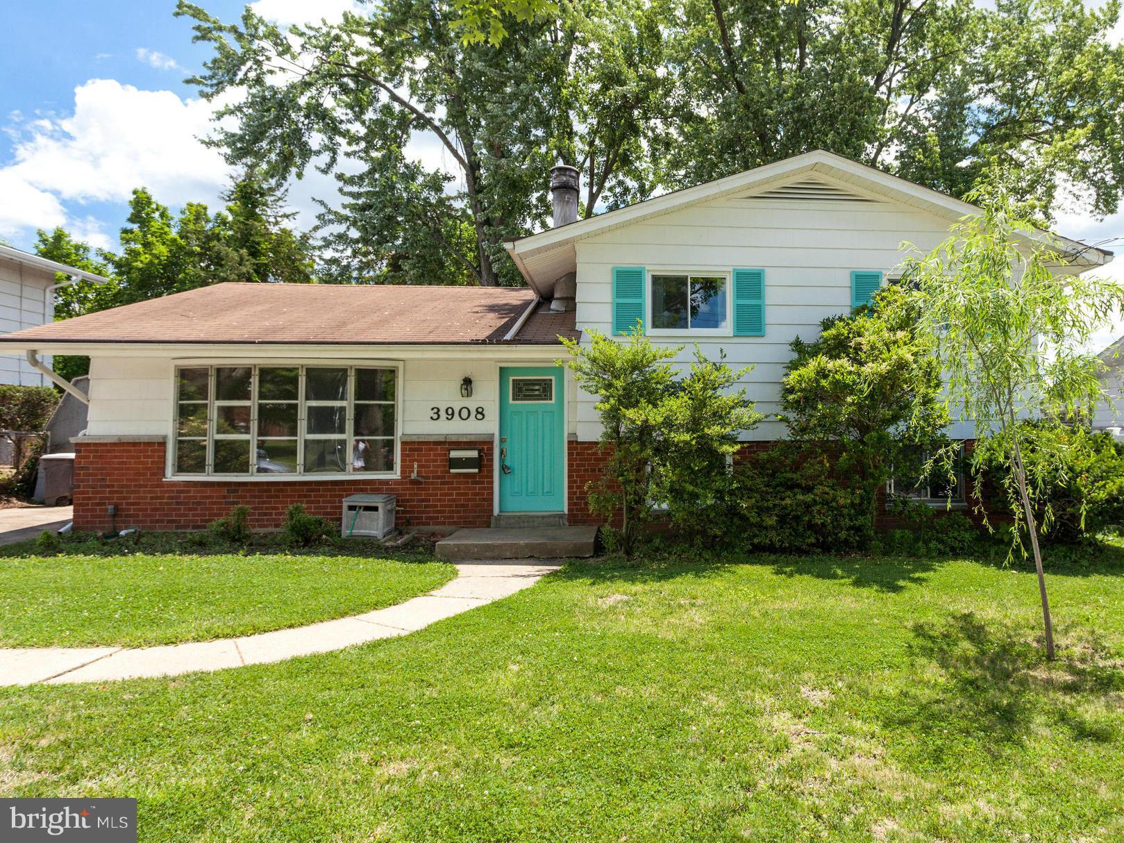 3908 Elby Street Silver Spring, MD 20906 - Photo 1 of 24 a view of a house with a yard and sitting area
