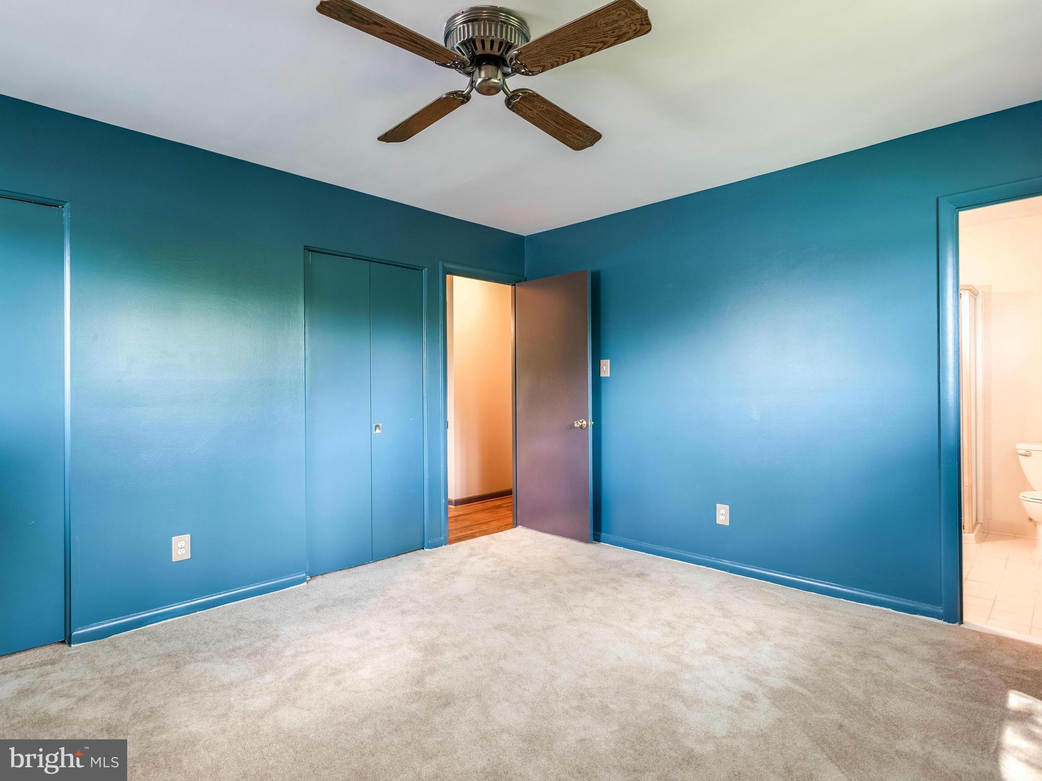 3908 Elby Street Silver Spring, MD 20906 - Photo 12 of 24 a view of a livingroom with a ceiling fan and window