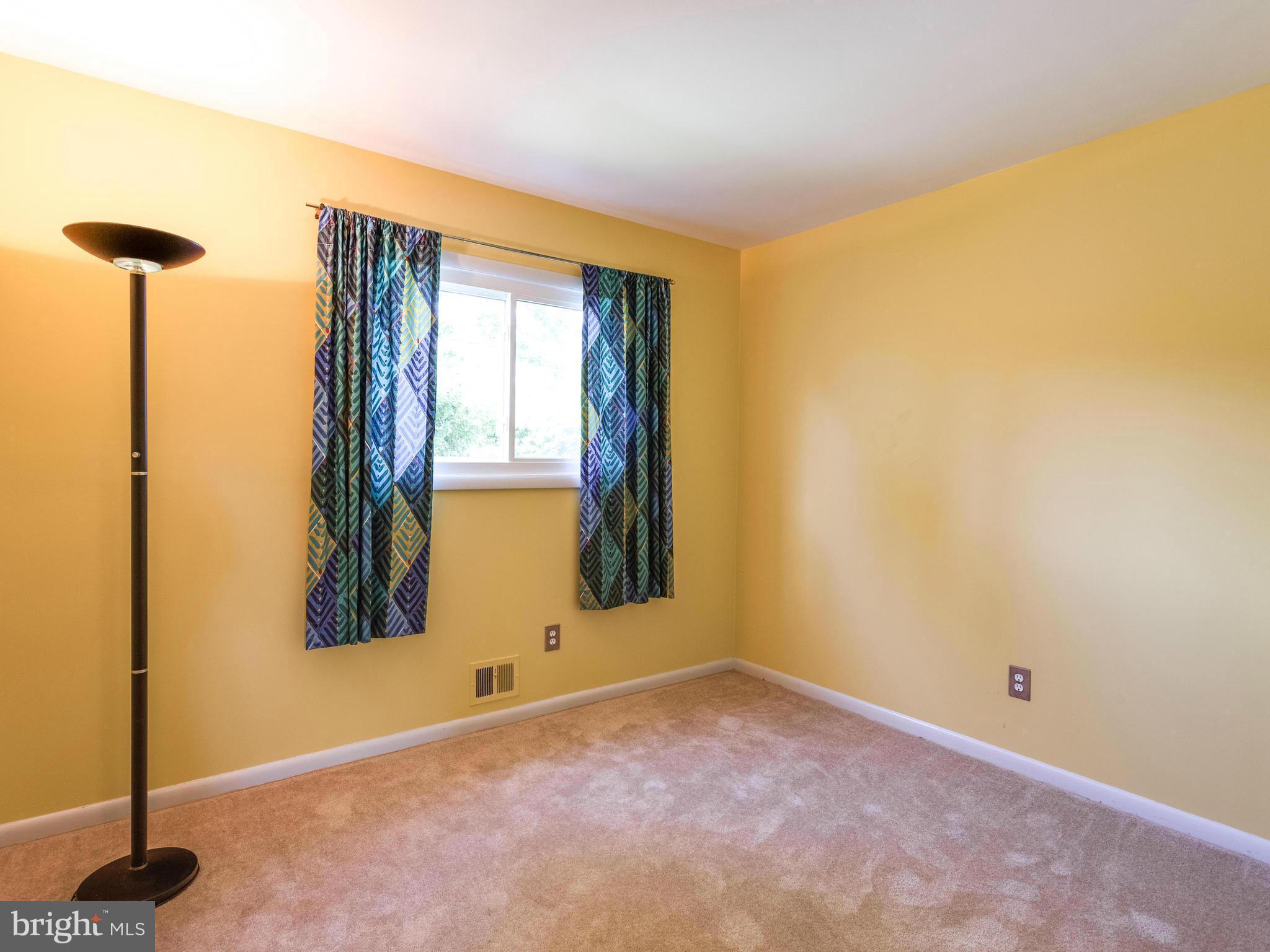 3908 Elby Street Silver Spring, MD 20906 - Photo 15 of 24 a view of an empty room with a window