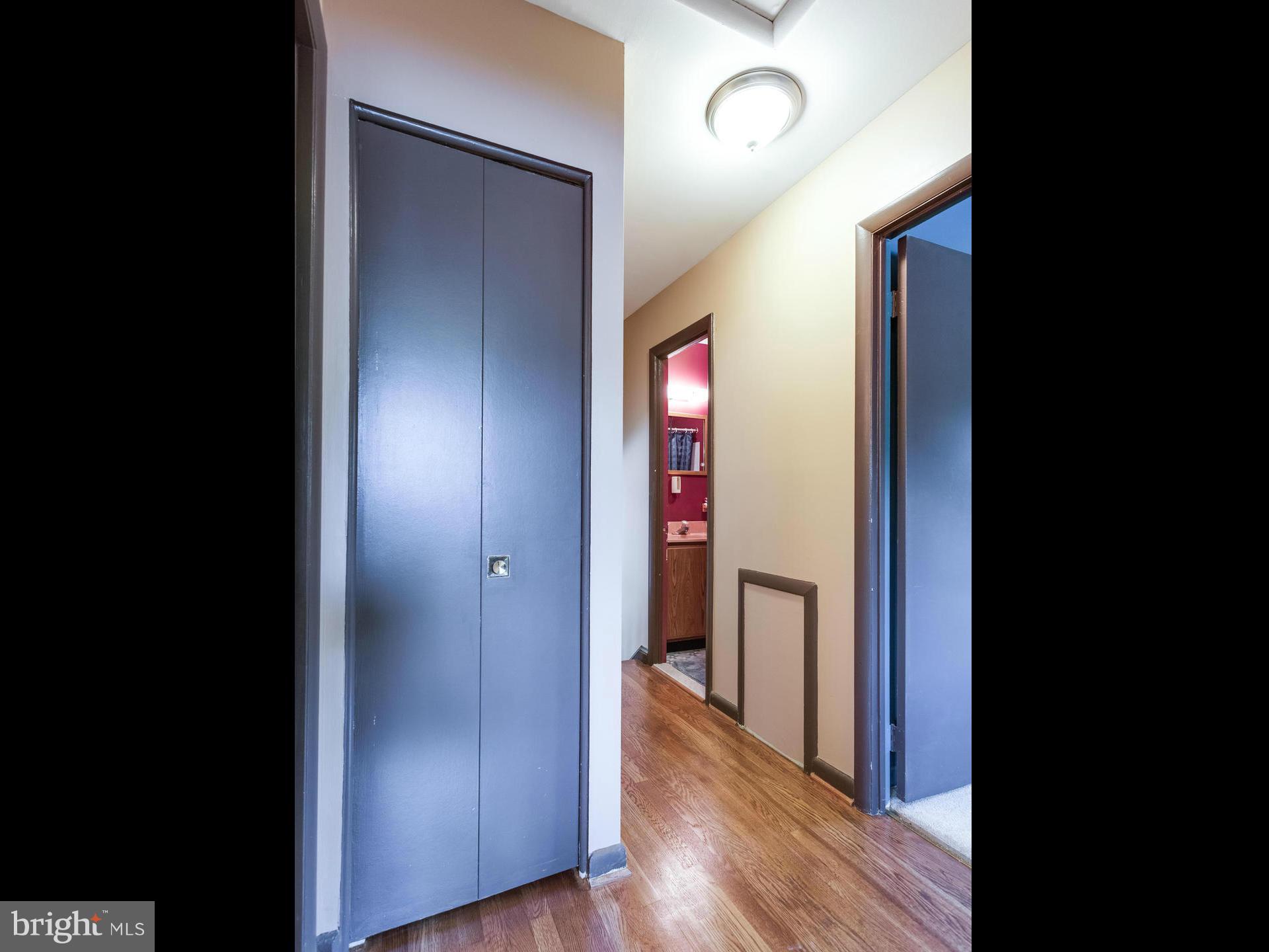 3908 Elby Street Silver Spring, MD 20906 - Photo 18 of 24 a view of a hallway with wooden floor