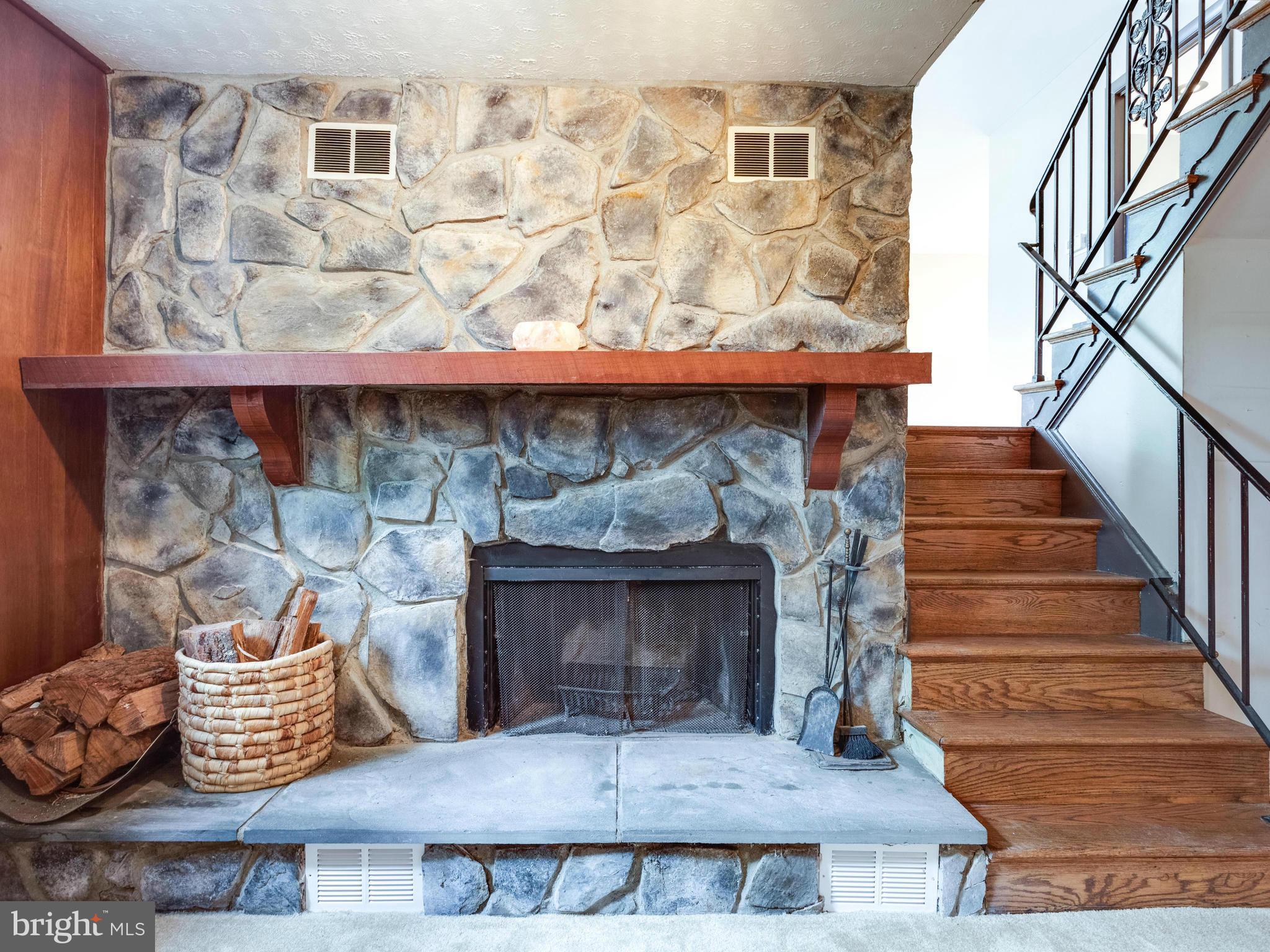 3908 Elby Street Silver Spring, MD 20906 - Photo 21 of 24 a fireplace with wooden floor