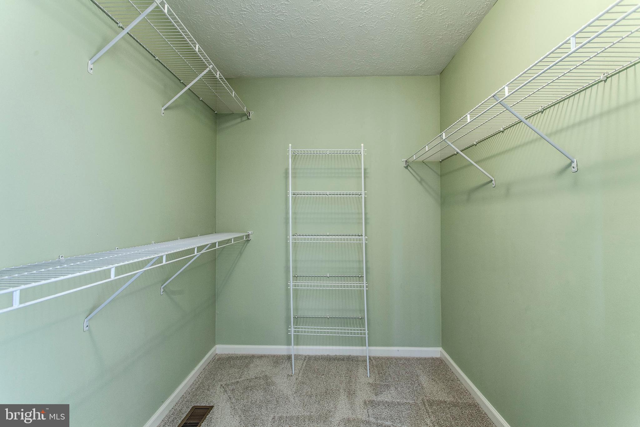7737 Rotherham Drive Hanover, MD 21076 - Photo 16 of 36 Master bedroom walk in closet