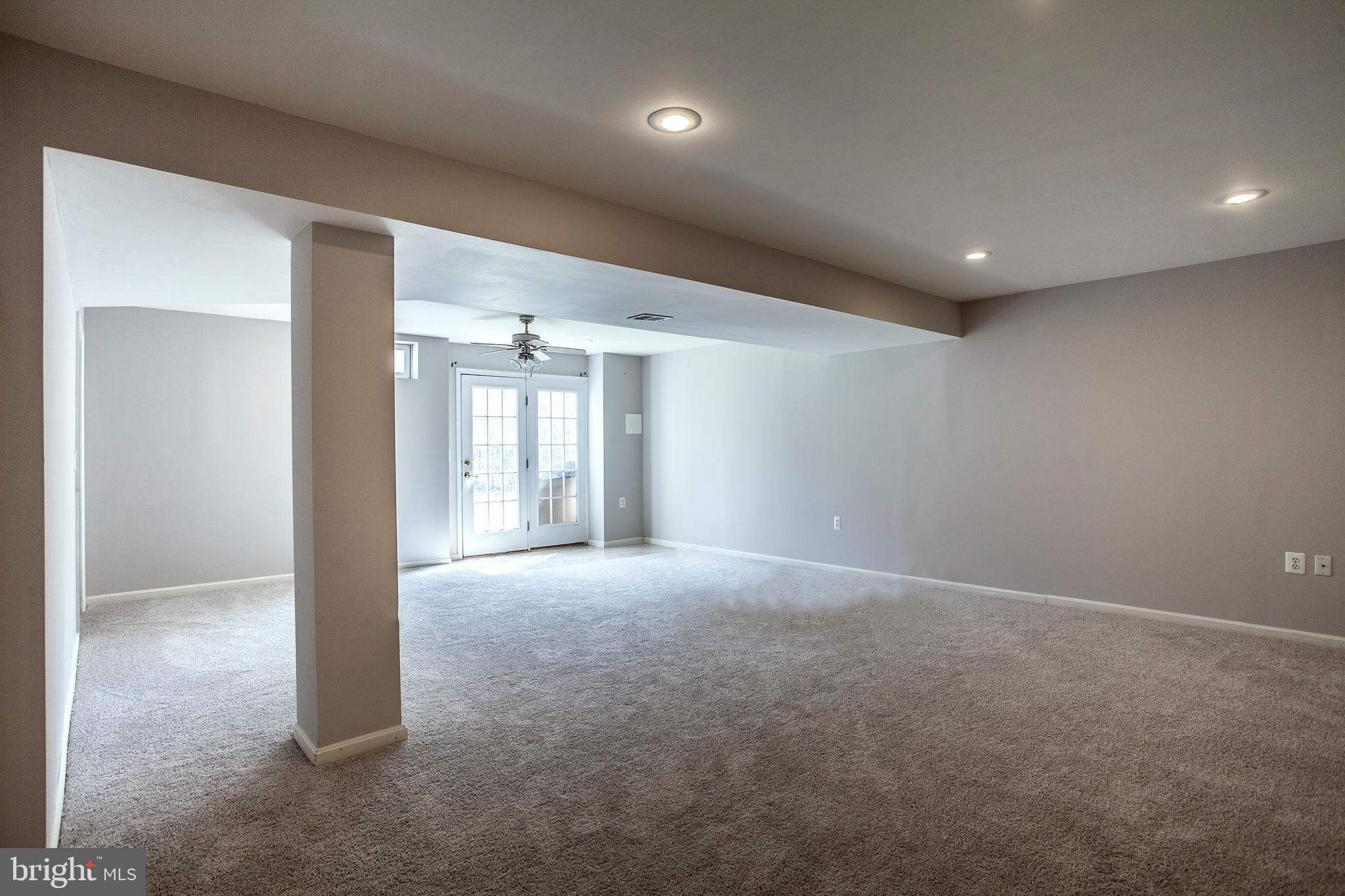 7737 Rotherham Drive Hanover, MD 21076 - Photo 27 of 36 fully finished basement with new carpet , walk-out