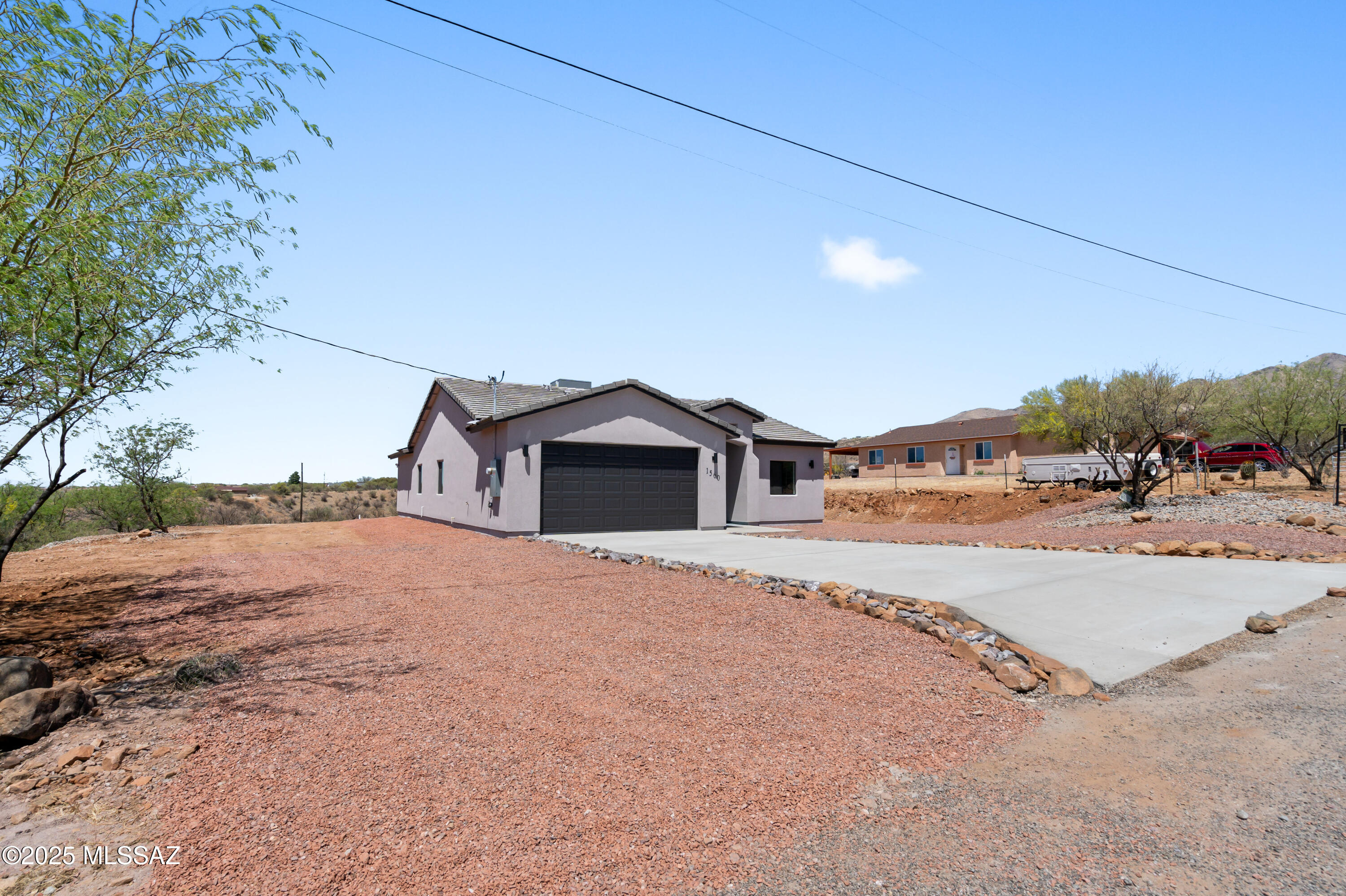 1560 Pinguinos Court Rio Rico, AZ 85648 - Photo 3 of 33 a house with a outdoor space