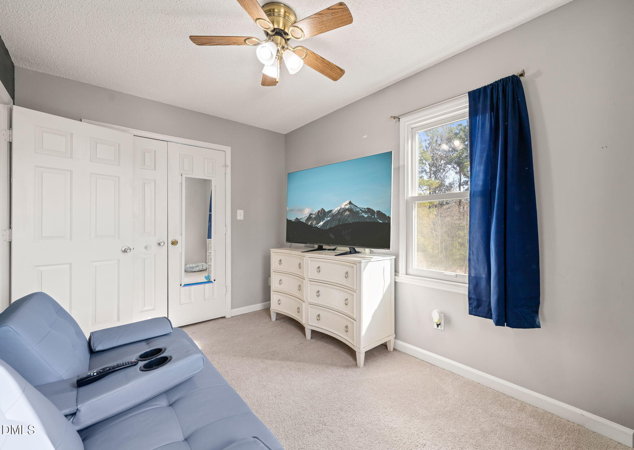 3649 Cleveland Road Smithfield, NC 27577 - Photo 22 of 37 a living room with furniture and a window
