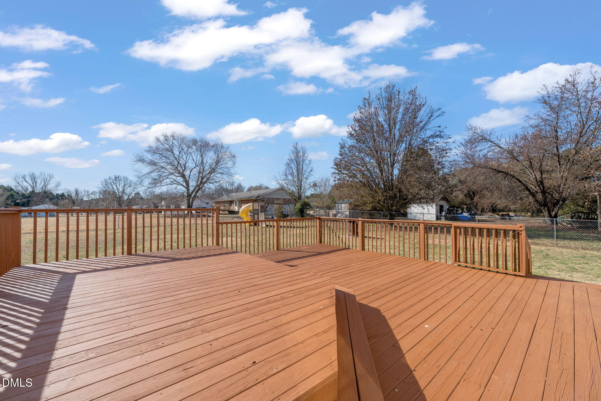 3649 Cleveland Road Smithfield, NC 27577 - Photo 28 of 37 a view of balcony with wooden floor and fence