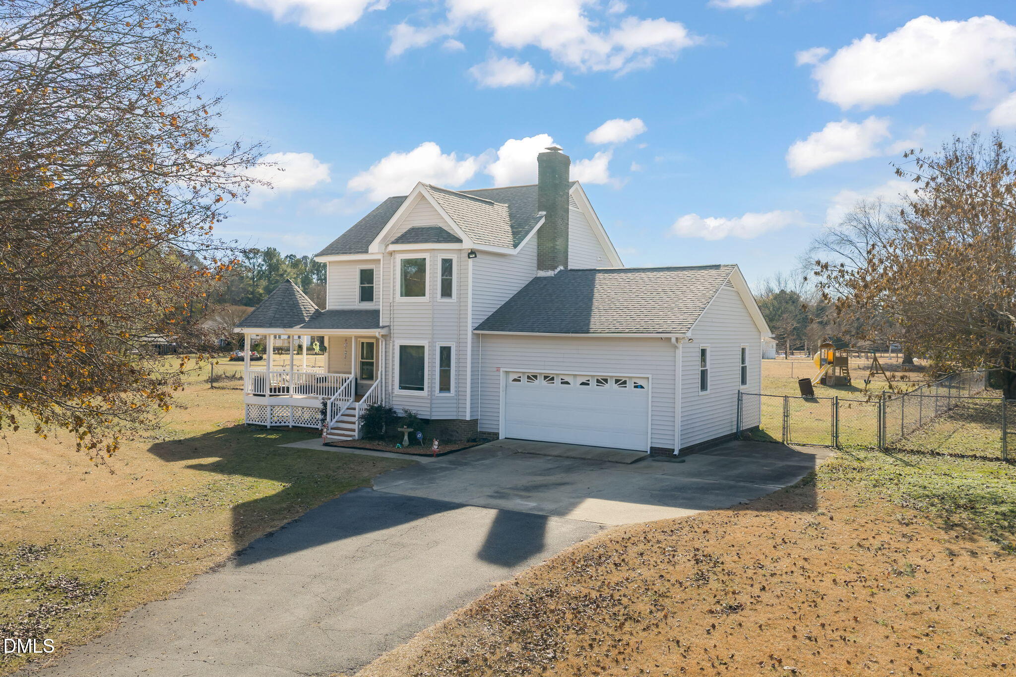 3649 Cleveland Road Smithfield, NC 27577 - Photo 33 of 37 a view of a house with a yard