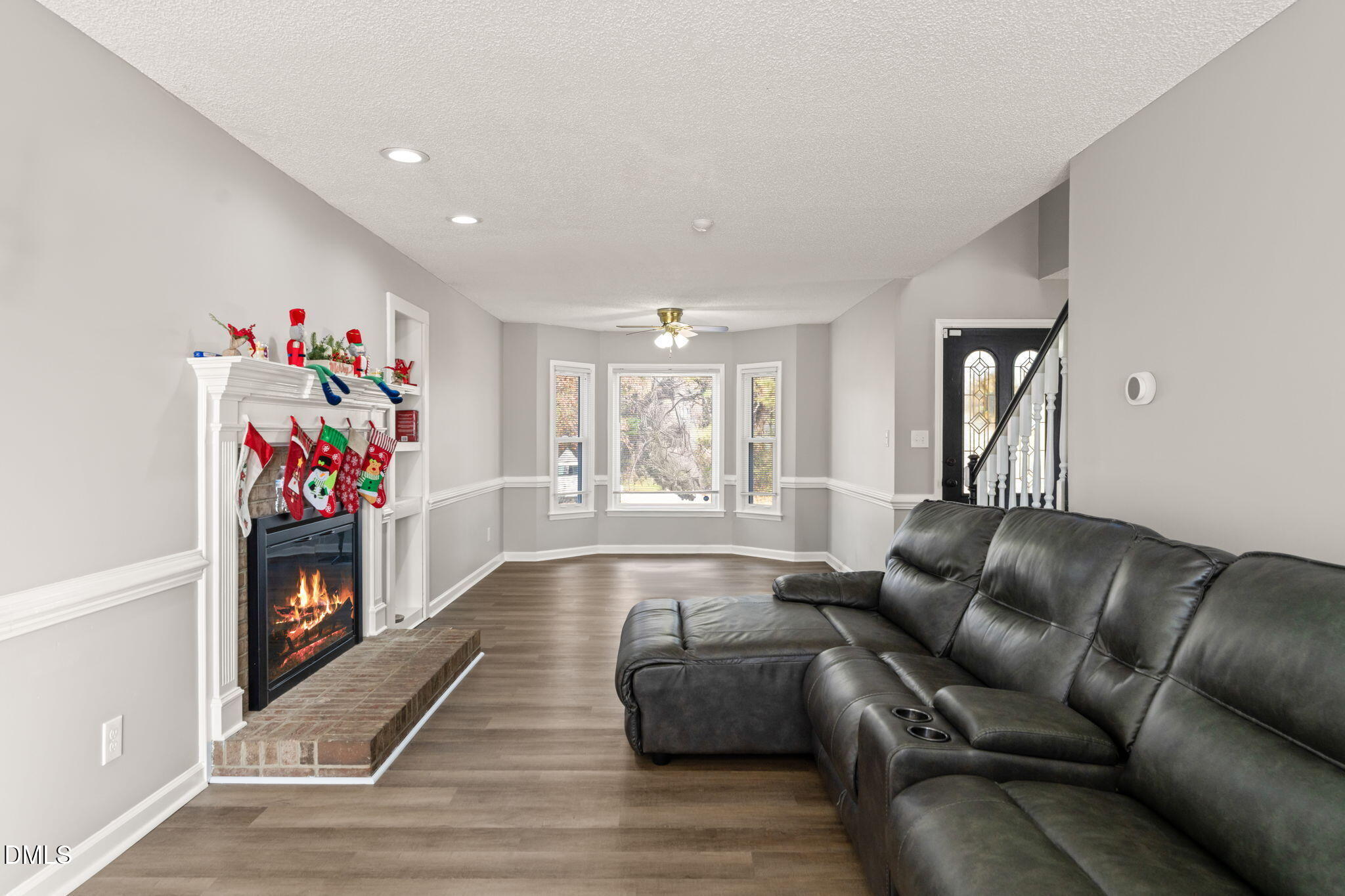 3649 Cleveland Road Smithfield, NC 27577 - Photo 4 of 37 a living room with furniture fireplace and a window