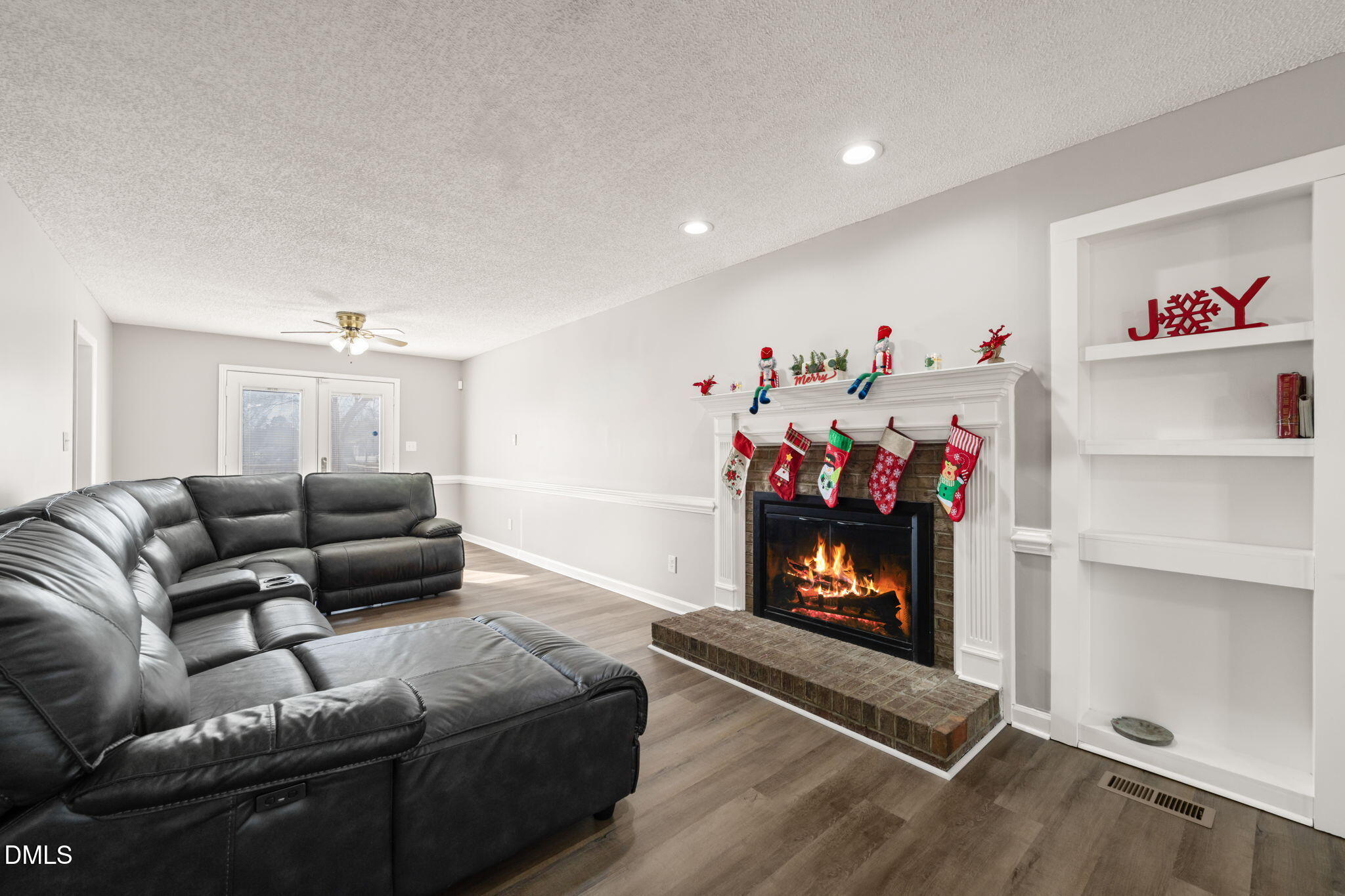 3649 Cleveland Road Smithfield, NC 27577 - Photo 5 of 37 a living room with furniture and a fireplace
