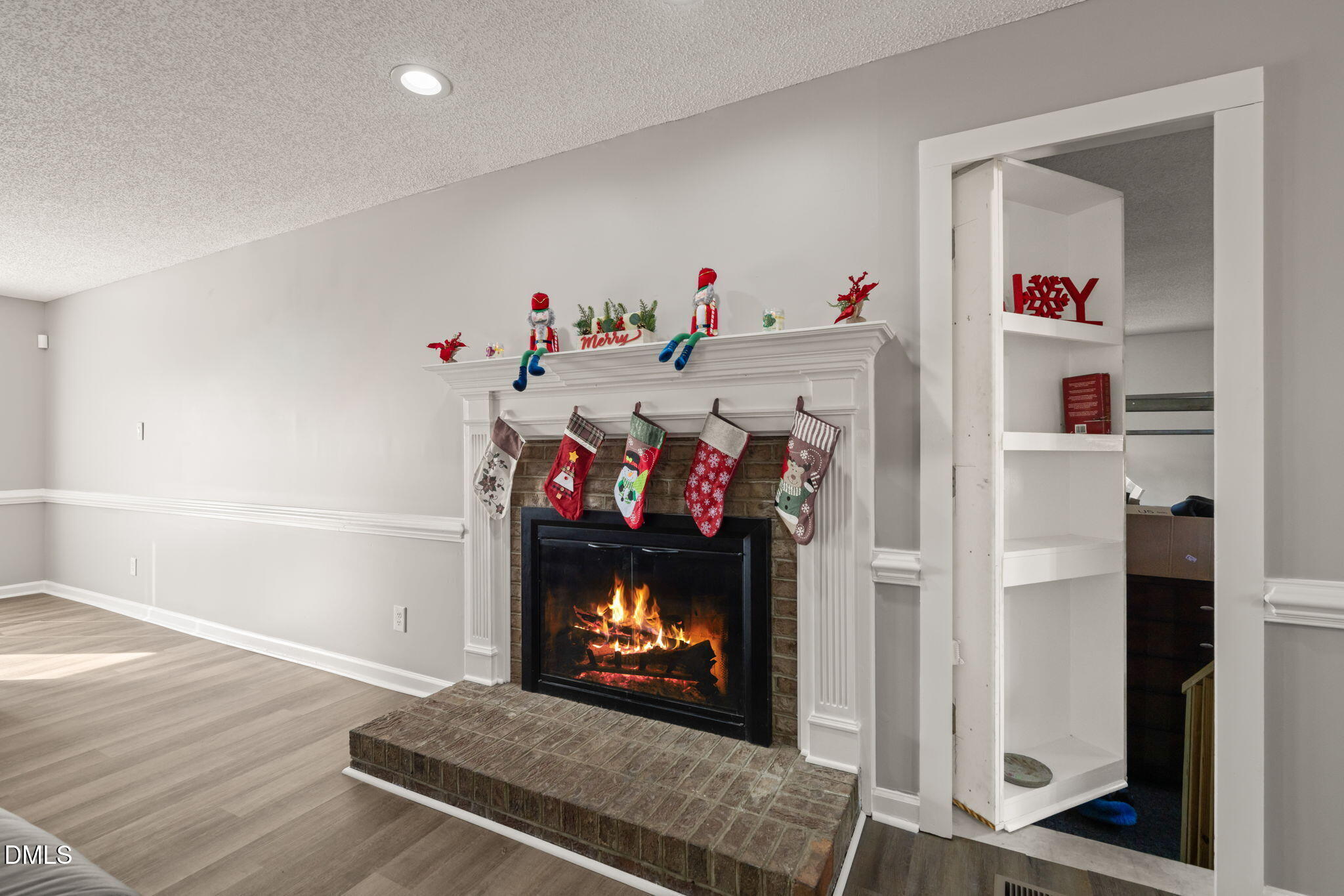 3649 Cleveland Road Smithfield, NC 27577 - Photo 6 of 37 a living room with furniture and a fireplace