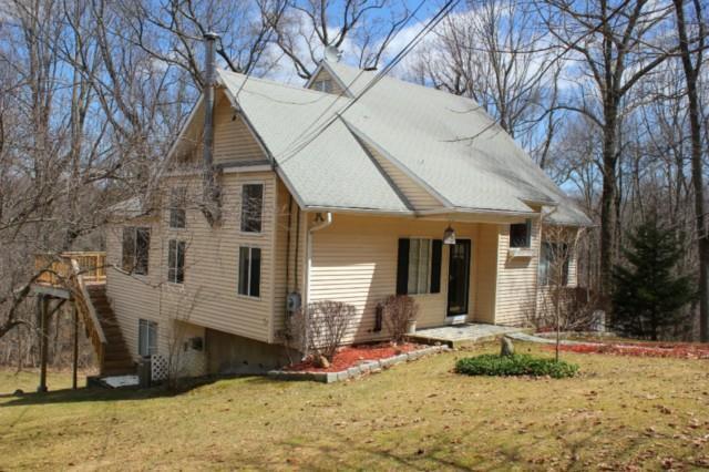 10 Dittmar Road Bethel, CT 06801 - Photo 1 of 1 a view of a white house with a yard and large tree