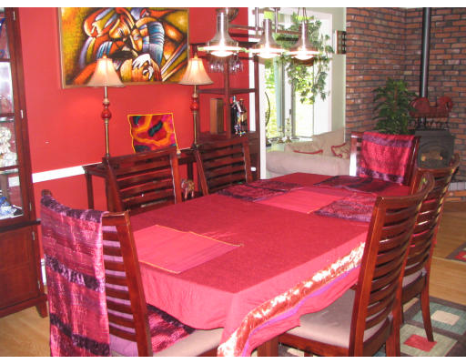 125 Franklin Road Longmeadow, MA 01106 - Photo 3 of 10 a patio with table and chairs and potted plants
