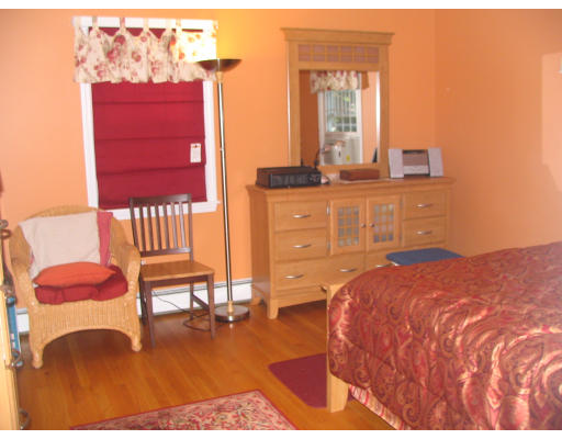 125 Franklin Road Longmeadow, MA 01106 - Photo 7 of 10 a bedroom with a bed and a dresser