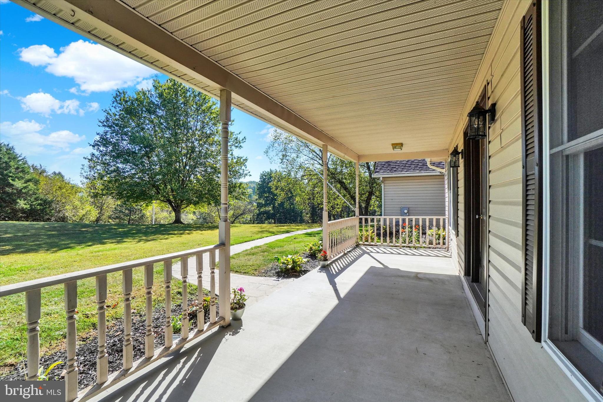 1240 Green Ridge Road East Berlin, PA 17316 - Photo 5 of 49 Large front porch for your rockers & porch swing!