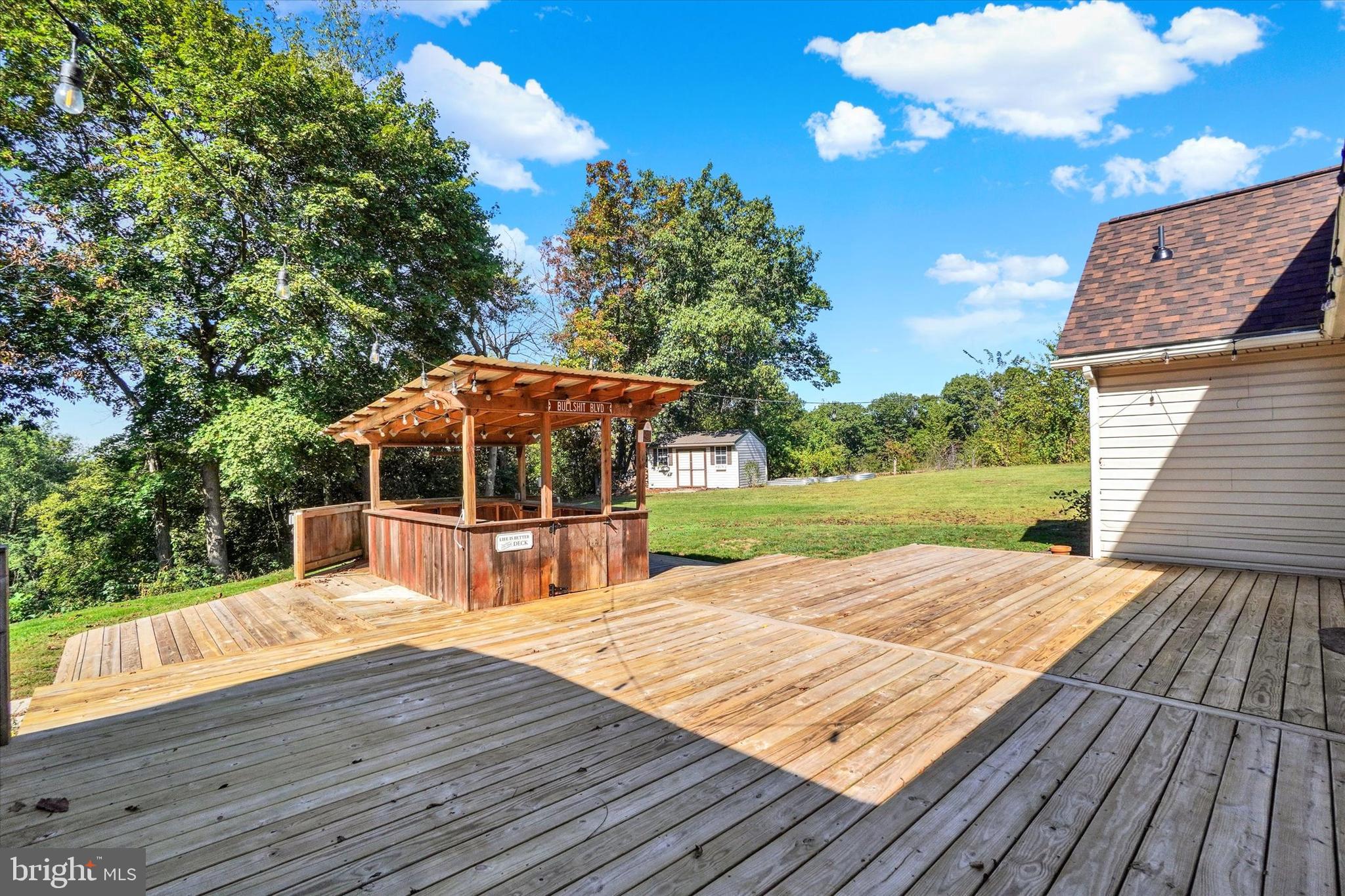 1240 Green Ridge Road East Berlin, PA 17316 - Photo 8 of 49 Stepping outside to the huge deck with cabana...
