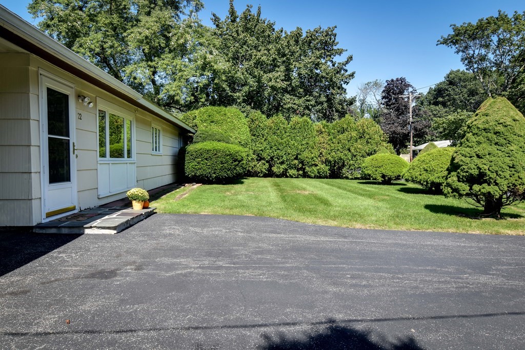 22 Francine Road Framingham, MA 01701 - Photo 2 of 30 a view of a house with a backyard
