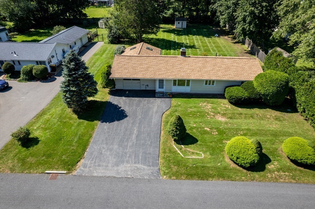 22 Francine Road Framingham, MA 01701 - Photo 28 of 30 a view of a swimming pool with some potted plants