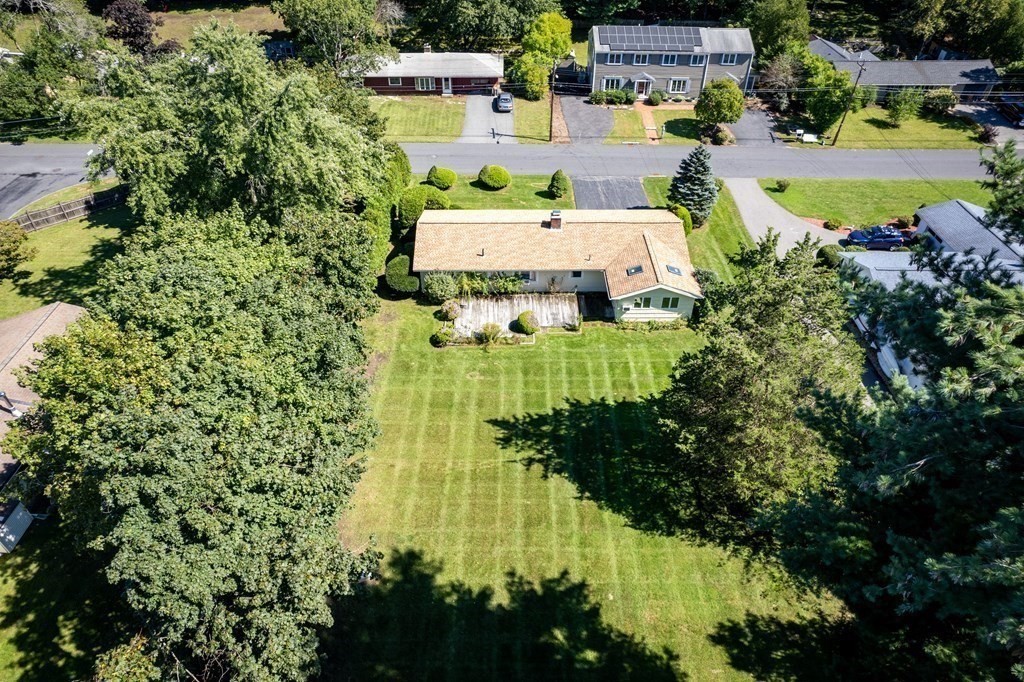 22 Francine Road Framingham, MA 01701 - Photo 30 of 30 a view of a swimming pool with a yard and plants
