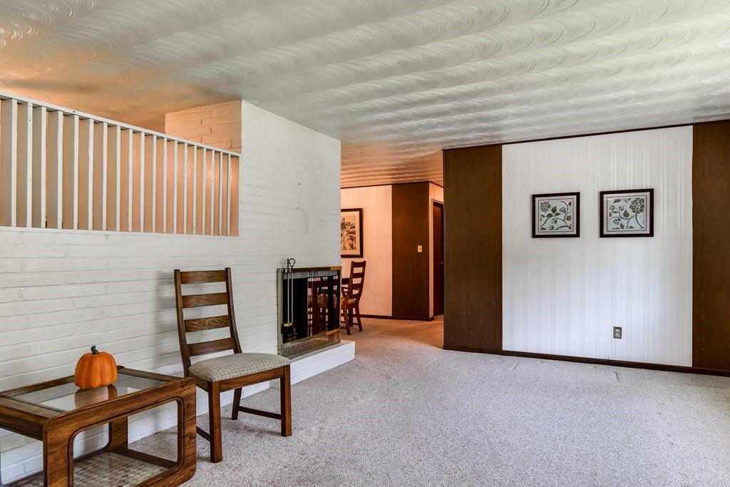 22 Francine Road Framingham, MA 01701 - Photo 3 of 30 a reading room with furniture and wooden floor