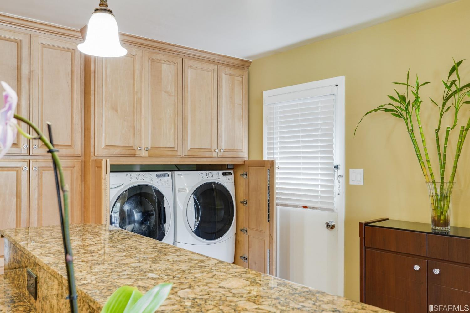 474 Oak Avenue San Bruno, CA 94066 - Photo 11 of 51 a view of a bedroom with a bed and a fireplace