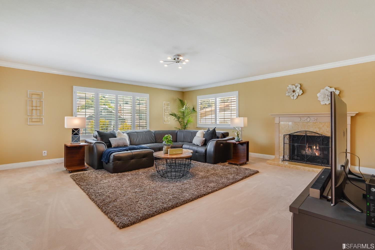 474 Oak Avenue San Bruno, CA 94066 - Photo 4 of 51 a living room with furniture and a fireplace