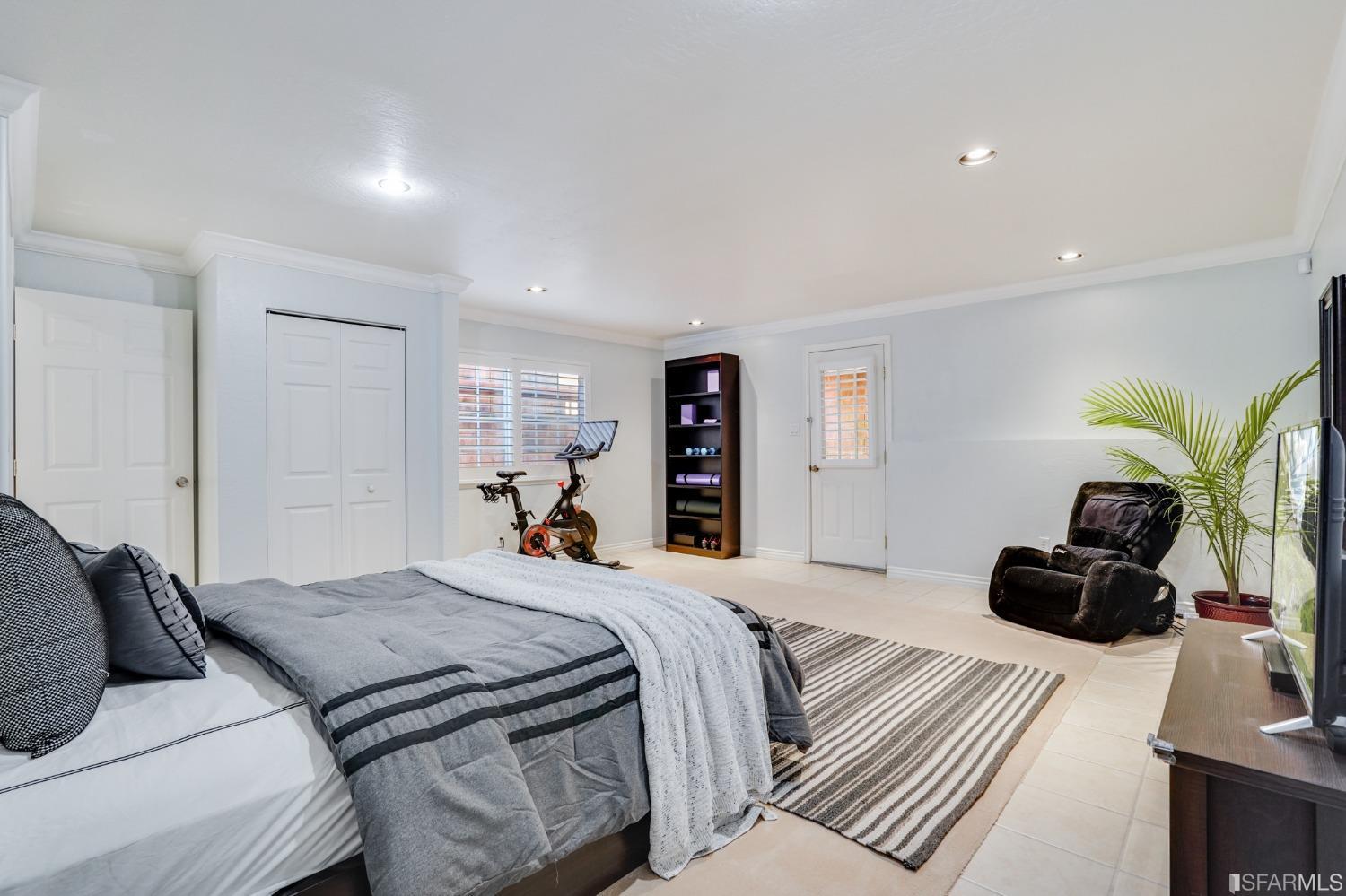 474 Oak Avenue San Bruno, CA 94066 - Photo 42 of 51 a bedroom with a bed and a couch