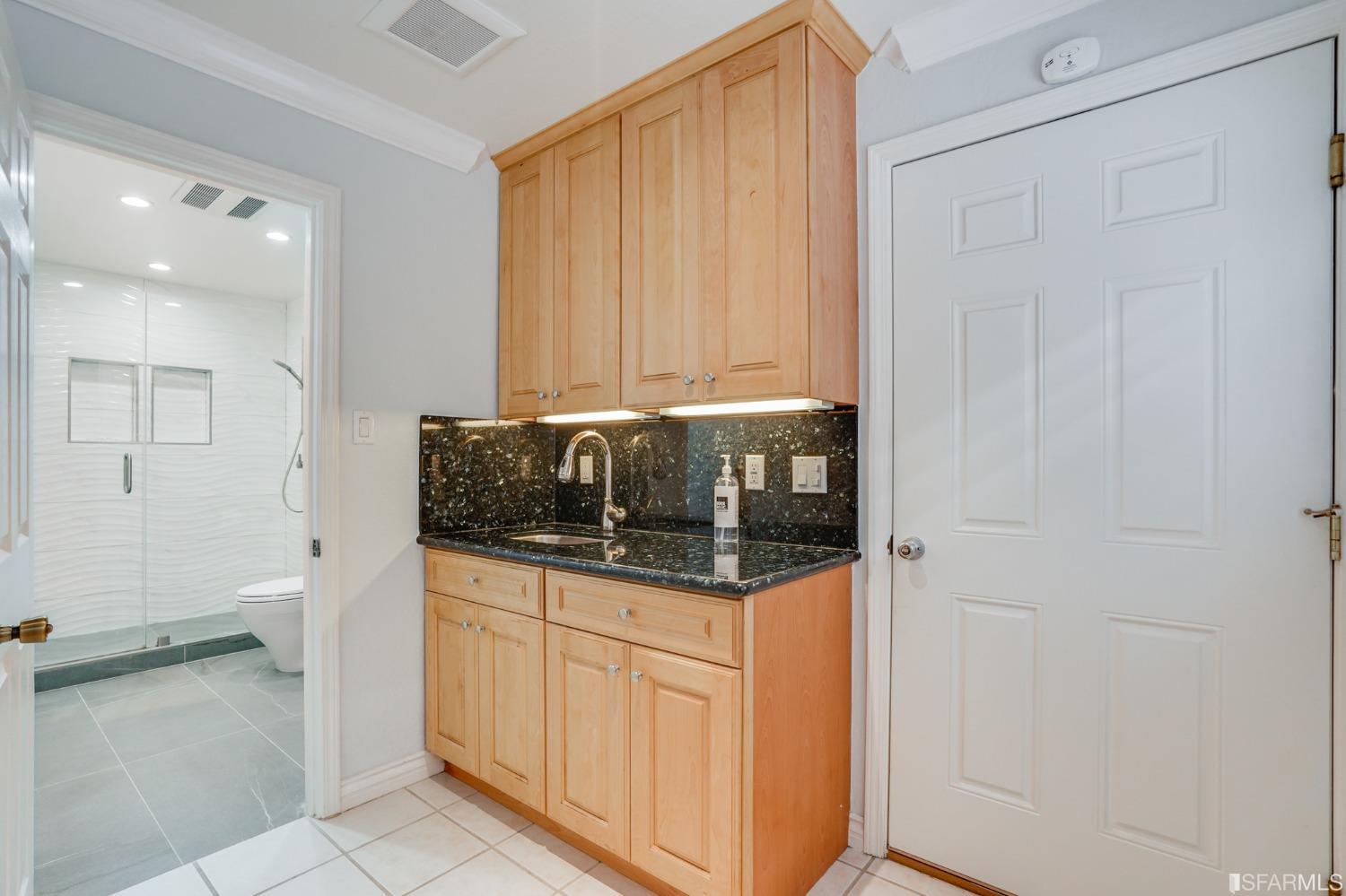 474 Oak Avenue San Bruno, CA 94066 - Photo 45 of 51 a kitchen with stainless steel appliances a counter top space and cabinets