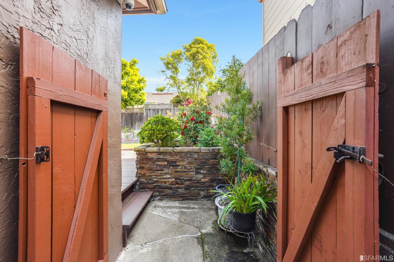 474 Oak Avenue San Bruno, CA 94066 - Photo 48 of 51 a view of a pathway along with potted plants
