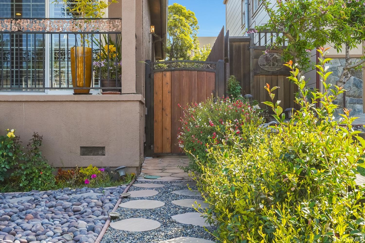 474 Oak Avenue San Bruno, CA 94066 - Photo 49 of 51 a view of a pathway of a house with potted plants