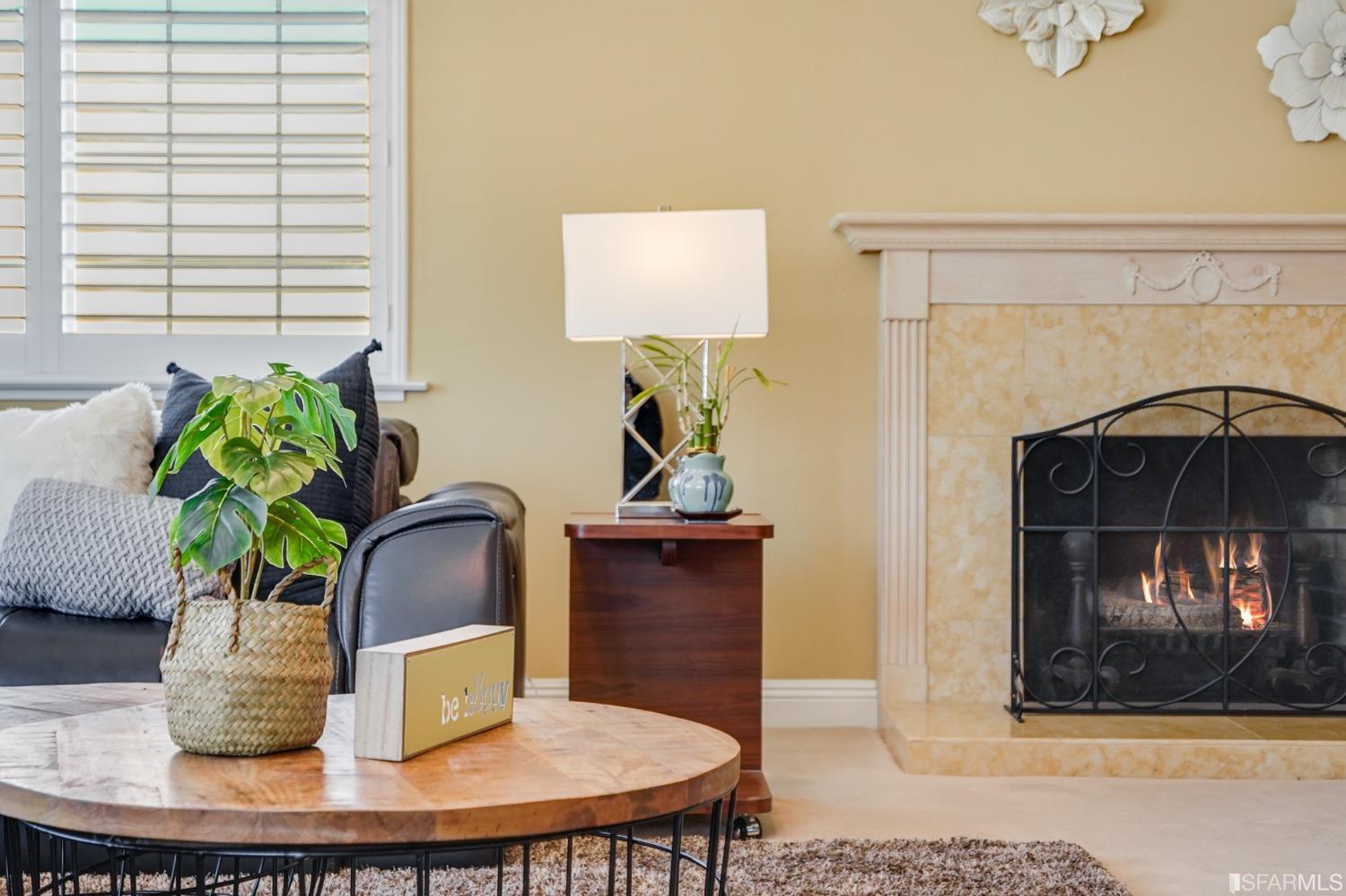 474 Oak Avenue San Bruno, CA 94066 - Photo 5 of 51 a vase of flowers sitting on a dining table