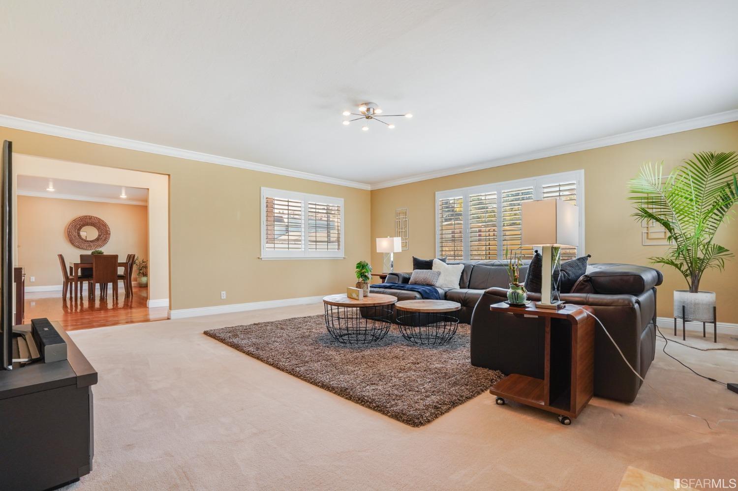 474 Oak Avenue San Bruno, CA 94066 - Photo 7 of 51 a living room with furniture potted plant and a window