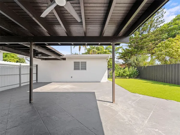 a view of a backyard of a house
