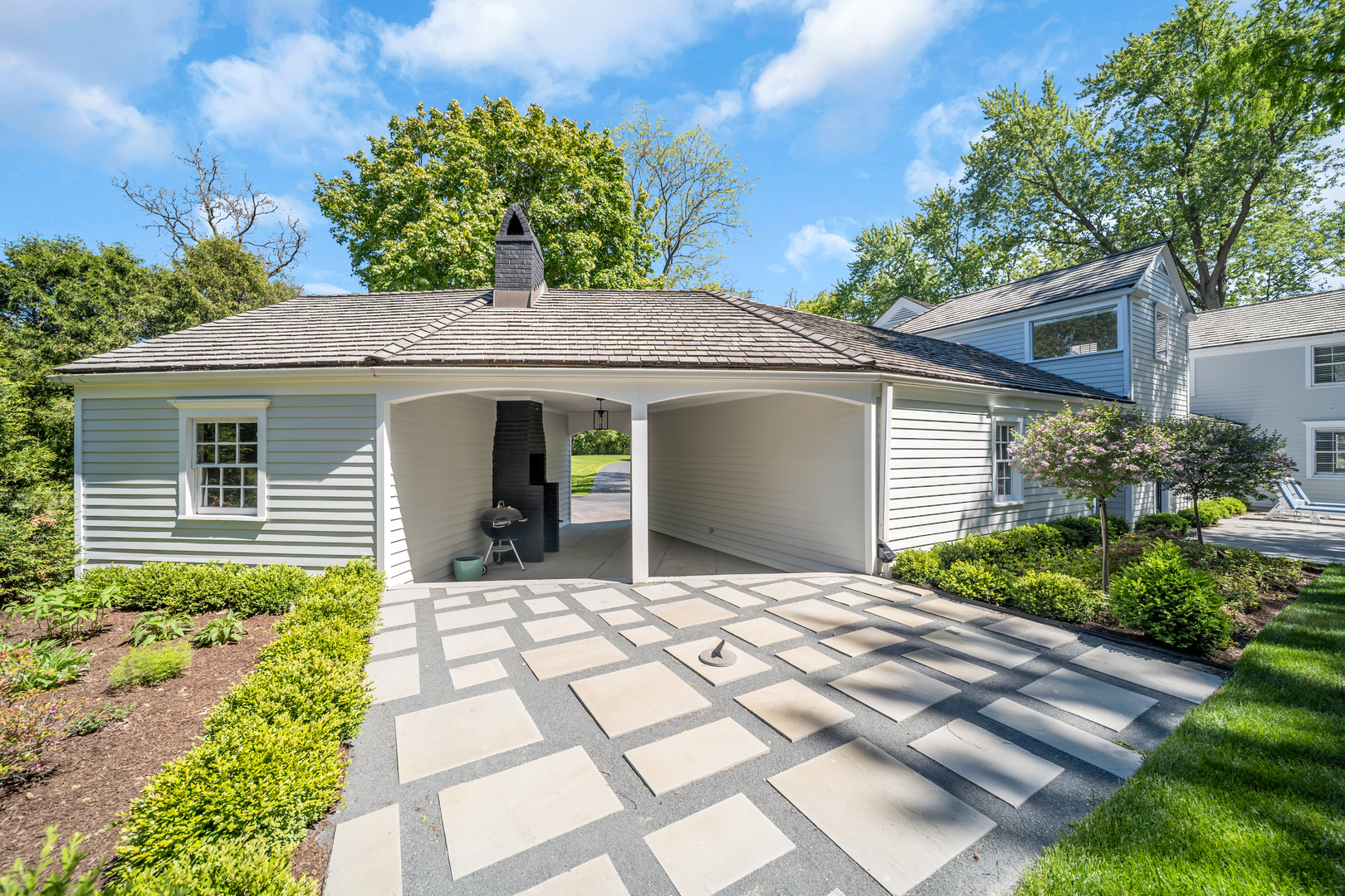 32 Otis Road Barrington Hills, IL 60010 - Photo 36 of 48 a house view with a garden space
