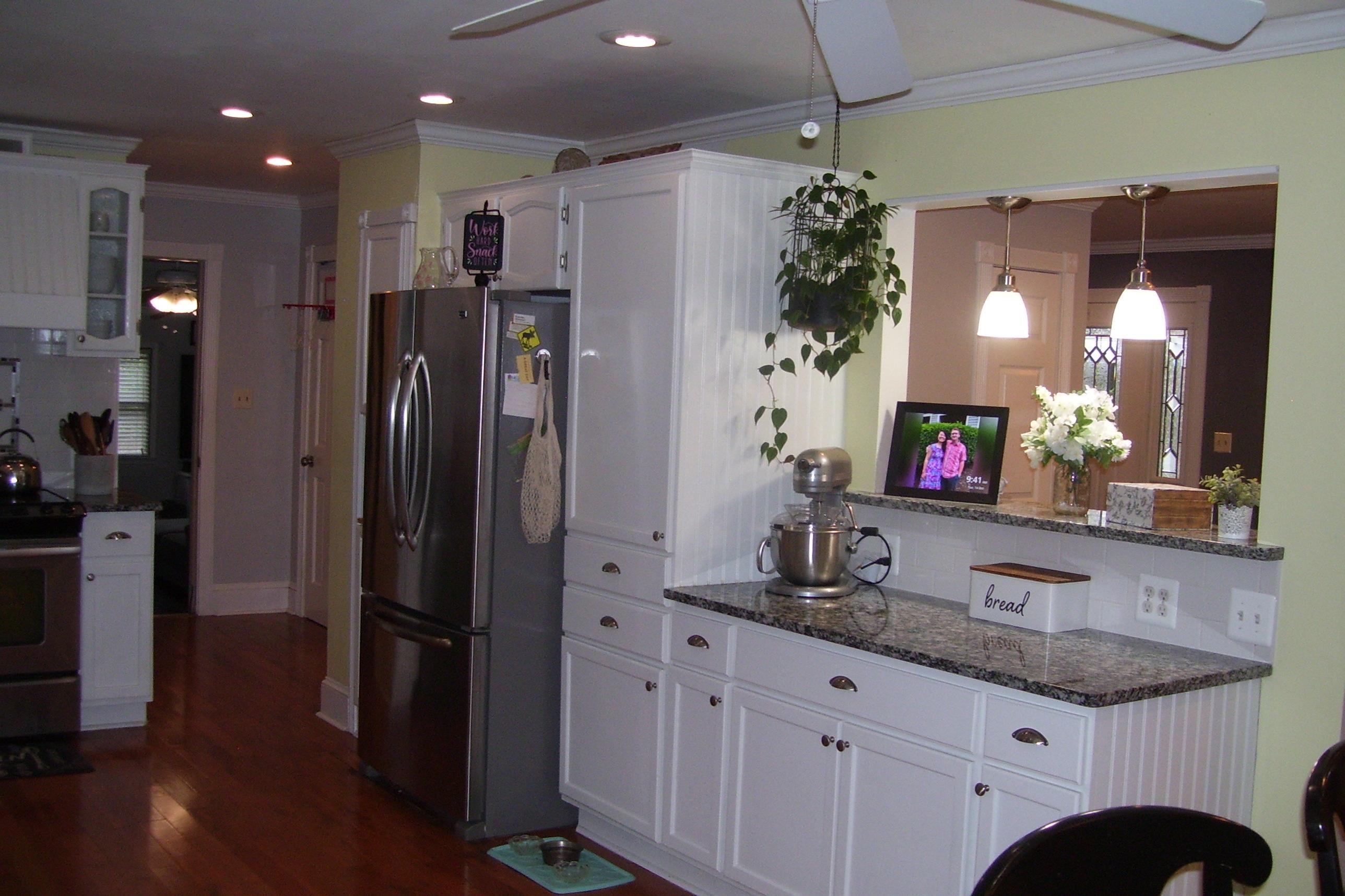 743 Comertown Road Shenandoah, VA 22849 - Photo 13 of 28 a kitchen with kitchen island granite countertop a refrigerator and a sink